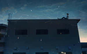 Anime Boy On Building Roof Wallpaper