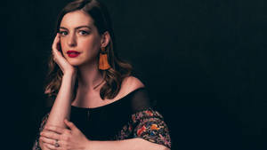 Anne Hathaway In Black Floral Dress Wallpaper