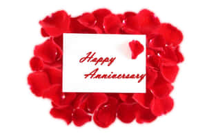 Anniversary Message Card On Rose Petals Wallpaper