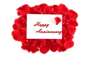 Anniversary Message Card On Rose Petals Wallpaper