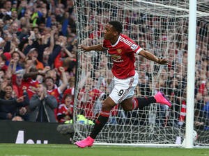 Anthony Martial Celebrating Near Goal Wallpaper