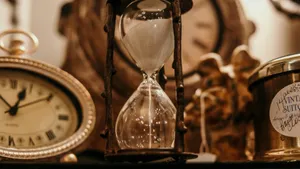 Antique Timepieces And Hourglass Wallpaper