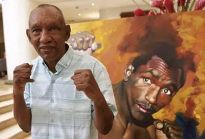 Antonio Cervantes And A Painting Of Younger Him Wallpaper