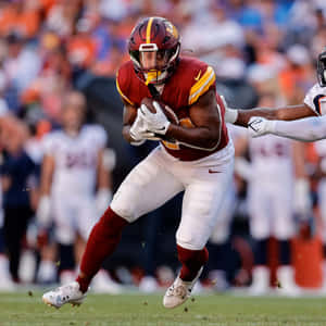 Antonio Gibson Football Action Shot Wallpaper