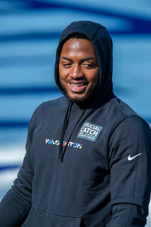 Antonio Gibson Smilingin Hoodie Wallpaper