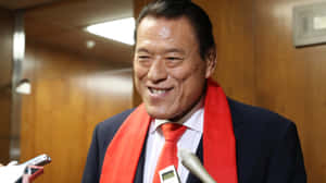 Antonio Inoki Addressing A Media Conference Wallpaper