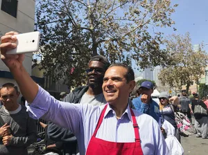 Antonio Villaraigosa Taking Picture Wallpaper