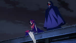 Aogiri Tree Standing Tall Against A Blood-red Sky Wallpaper