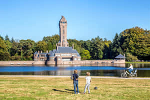 Apeldoorn Water Towerand Park Scene Wallpaper