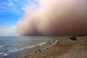 Approaching Dust Storm Beachside Wallpaper