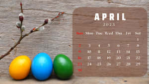 April 2013 Calendar With Colorful Eggs And A Branch Wallpaper