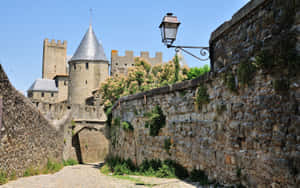 Arched Street In The Cite De Carcassonne Wallpaper