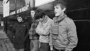 Arctic_ Monkeys_ Band_ Black_and_ White_ Photo Wallpaper