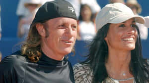 Argentina Tennis Player Guillermo Vilas And Gabriela Sabatini Wallpaper