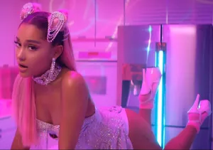 Ariana Grande Looks Fierce In Her Iconic 7 Rings Music Video Wallpaper
