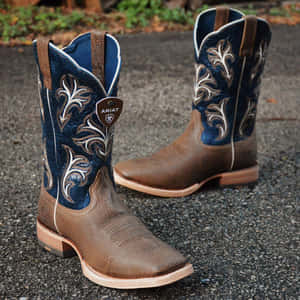 Ariat Cowboy Bootson Pavement Wallpaper