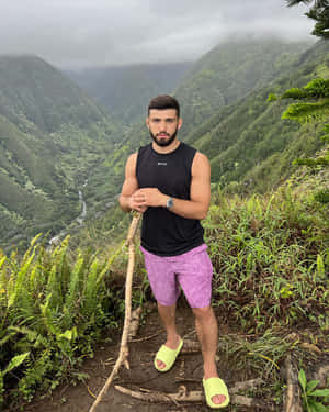 Arman Tsarukyan With Branch At Mountain Wallpaper