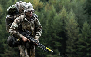 Armed Military In Forest Wallpaper