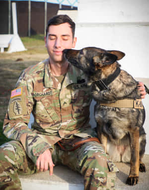 Army Dog Bonding Moment Wallpaper