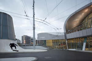 Arnhem Skateboarding Near Modern Architecture Wallpaper