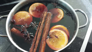 Aromatic And Heartwarming Mulled Wine With Spices Wallpaper