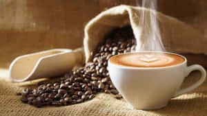 Aromatic Brown Coffee In A White Cup Wallpaper