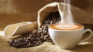 Aromatic Brown Coffee In A White Cup Wallpaper