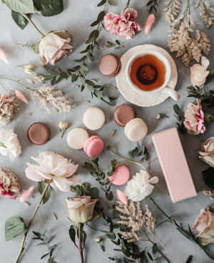 Aromatic Floral Tea In A Glass Teacup With Flowers Wallpaper