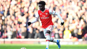 Arsenal Playerin Action During Match.jpg Wallpaper