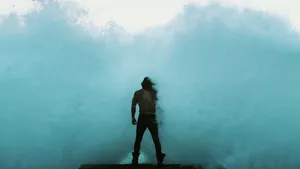 Arthur Curry Stands Tall Against The Raging Ocean. Wallpaper