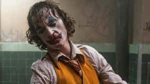 Arthur Fleck In Joker Makeup Wallpaper