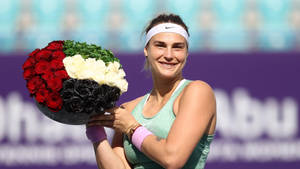 Aryna Sabalenka Holding Flowers Wallpaper