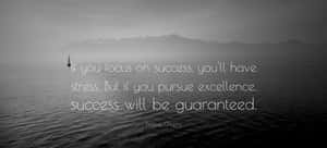 Ascending To Success - A Stunning Mountain Peak Against A Brilliant Sky. Wallpaper