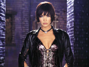 Ashley Scott Striking A Confident Pose Wallpaper