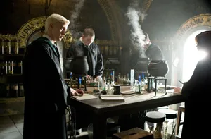 Aspiring Potioneers Hard At Work In The Hogwarts Potions Class Wallpaper