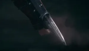Assassin's Creed Hero Showcasing Hidden Blades Wallpaper