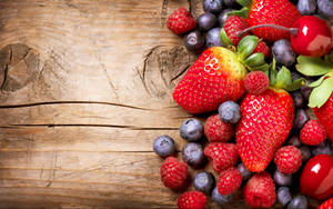 Assorted Berries On Wood Wallpaper