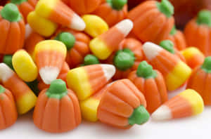 Assorted Halloween Candy Cornand Pumpkins Wallpaper