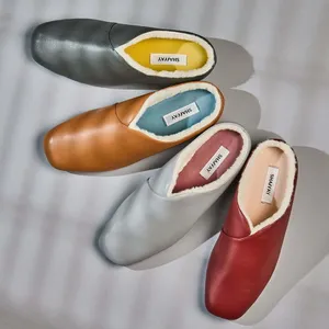 Assorted Leather Slippers Collection Wallpaper