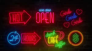 Assorted Neon Signson Brick Wall Wallpaper