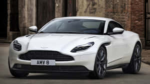 Aston Martin Db11 Luxury Sports Car In Action Wallpaper