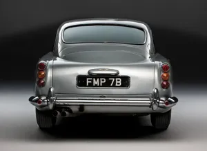 Aston Martin Db5 - The Classic British Luxury Grand Tourer Wallpaper