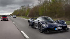 Aston Martin Valkyrie Hypercar In Action Wallpaper