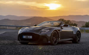 Aston Martin Vantage In Motion On The Road Wallpaper