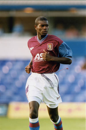 Aston Villa Ian Taylor Running Wallpaper