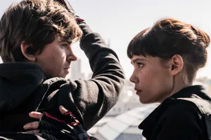 Astrid Berges-frisbey Poses Elegantly In An Outdoor Shoot Wallpaper