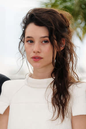 Astrid Berges-frisbey Posing For A Photoshoot Wallpaper