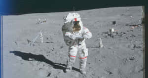 Astronaut Exploring The Lunar Surface Wallpaper