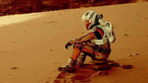 Astronaut Exploring The Martian Landscape Wallpaper