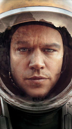 Astronaut Mark Watney (matt Damon) On The Vast Martian Surface Wallpaper